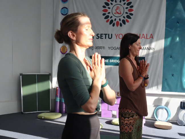 Yoga retreat group session at Om Setu Yogashala Rishikesh